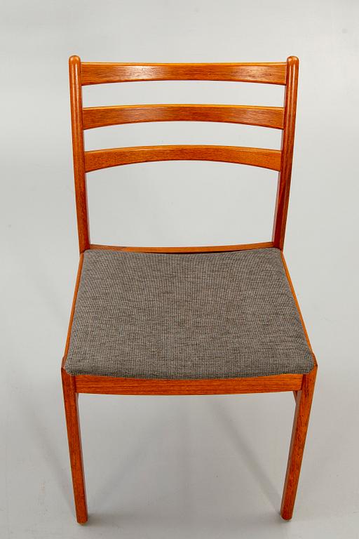 A set of six t1960s teak dining chairs.