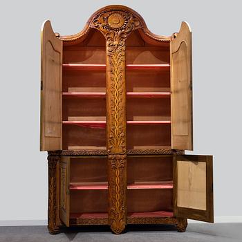 KNUT FJAESTAD, a folk art birch cabinet, early 20th century.