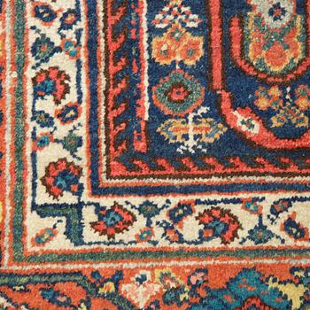 A carpet, Antique/semi-antique Mahal, ca  340 x 130-138 cm.