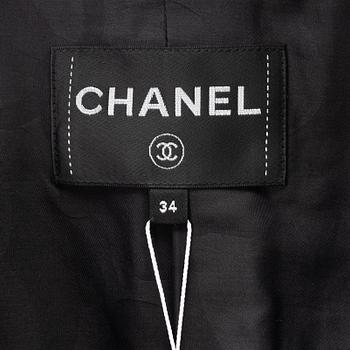 Chanel, A black bouclé jacket, size 34.