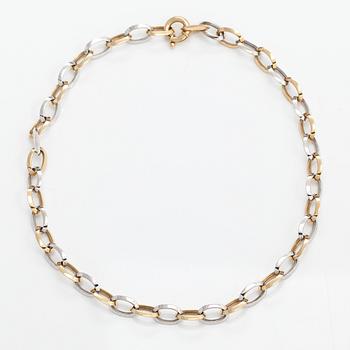 A 14K white and yellow gold necklace.
