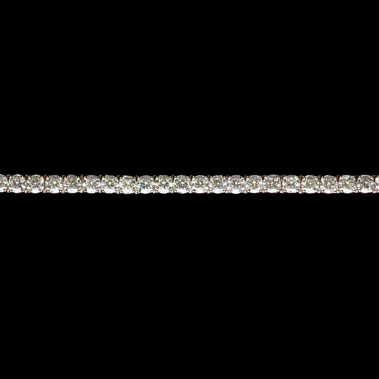 A diamond line bracelet, app. tot. 14 cts.