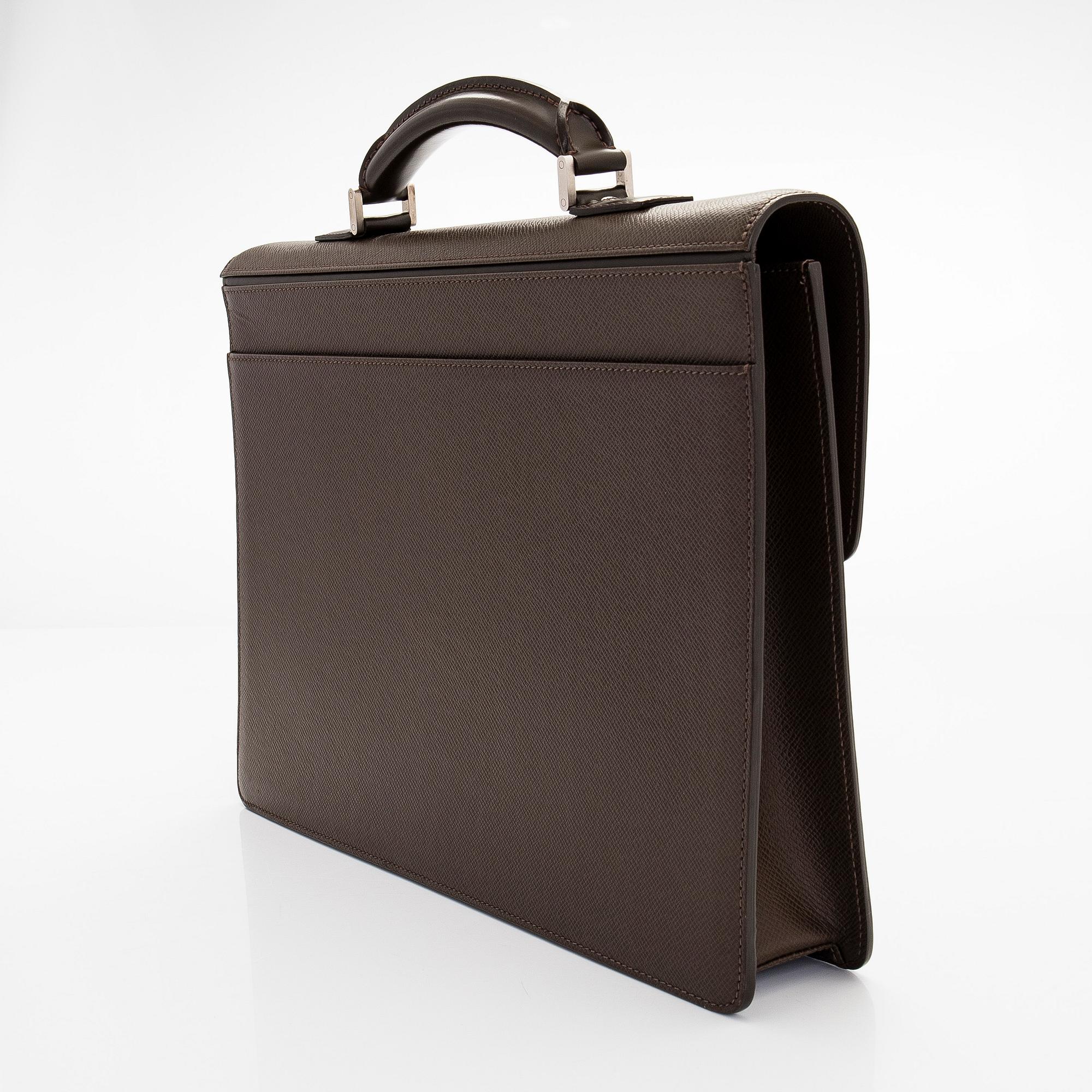 Louis Vuitton, a Taiga leather 'Neo Robusto' briefcase.