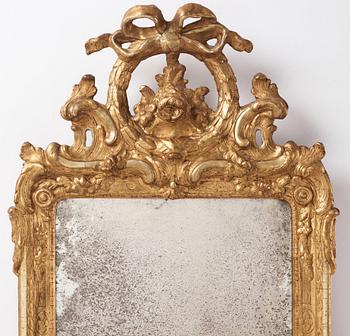 A giltwood rococo mirror by J. Åkerblad (master 1758-99).