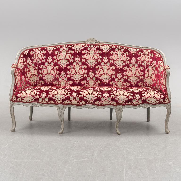 A 18th century rococo sofa.