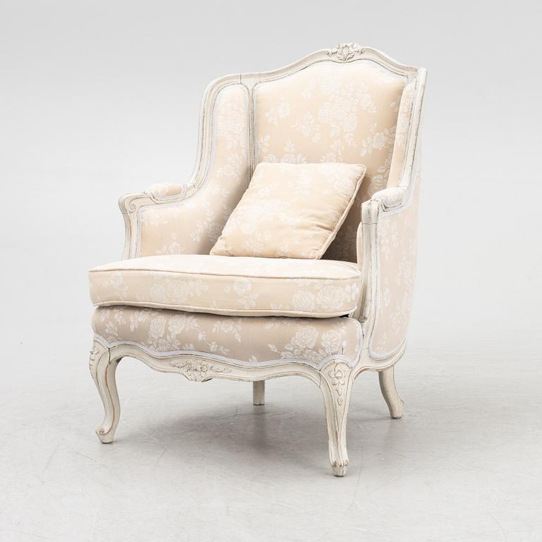 Armchair, bergère model, Rococo style, circa 1900.