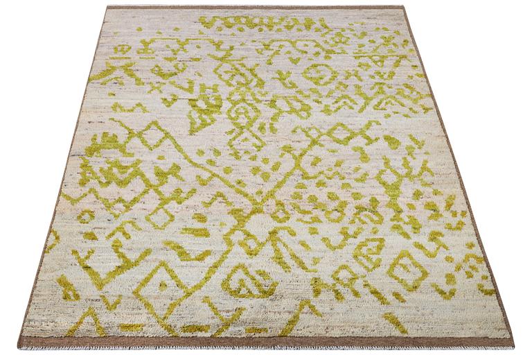 A Moroccan rug, c. 237 x 164 cm.