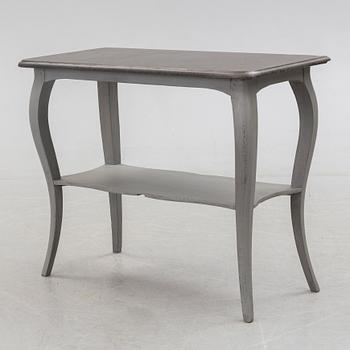 A first half of the 20th century painted table with marble top.