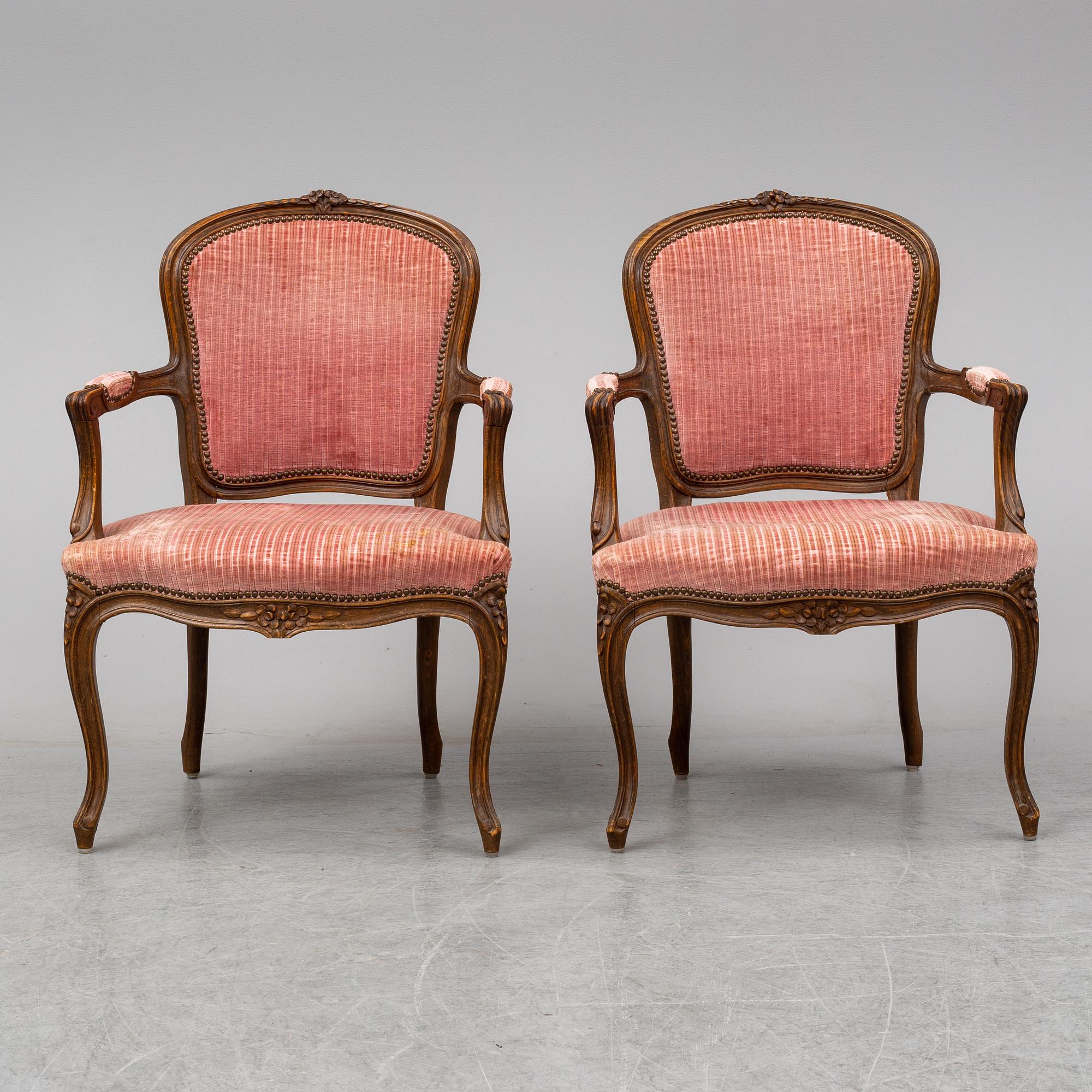 A pair of 19th-century rococo revival arm-chairs.