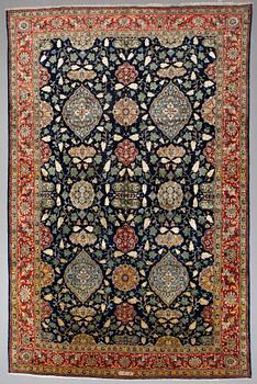 A CARPET so called Royal Kashan, part silk, signed, ca 483 x 311 cm.