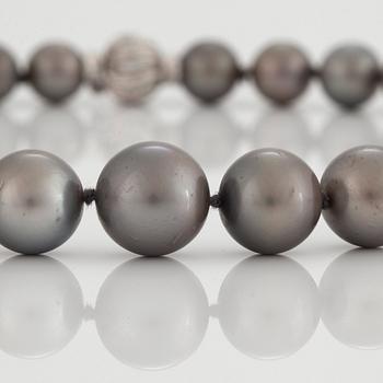 A NECKLACE of cultured Tahiti pearls.