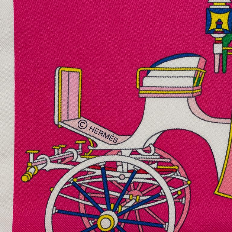 Hermès, a 'Voitures Excuises' silk scarf.