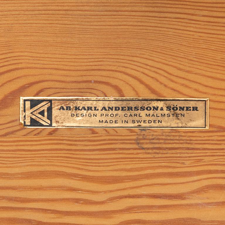 A pine stool by Carl Malmsten for Karl Andersson.