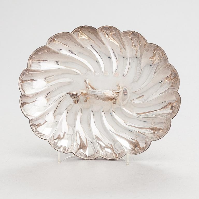 A scalloped silver dish, Pasgorcy, Madrid, Spain, after 1934.