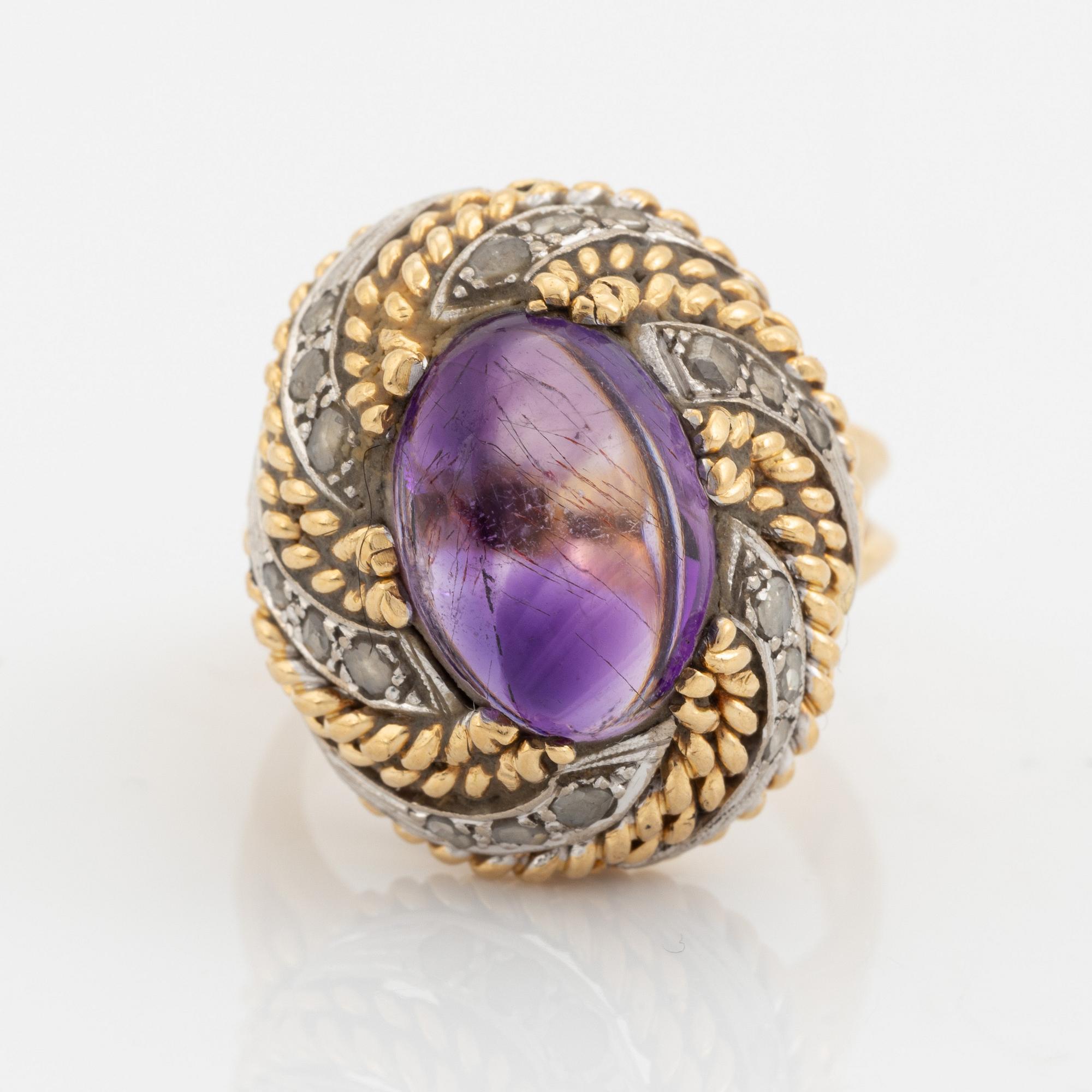 Cabochon cut amethyst and rose cut diamond ring.