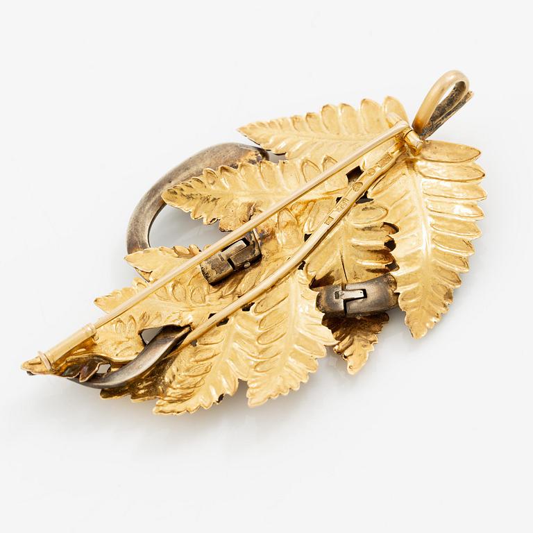 CF Carlman brosch 18K guld med en emaljerad silverorm.
