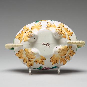 A rare Reval faiance tureen with cover and stand, 18th Century.