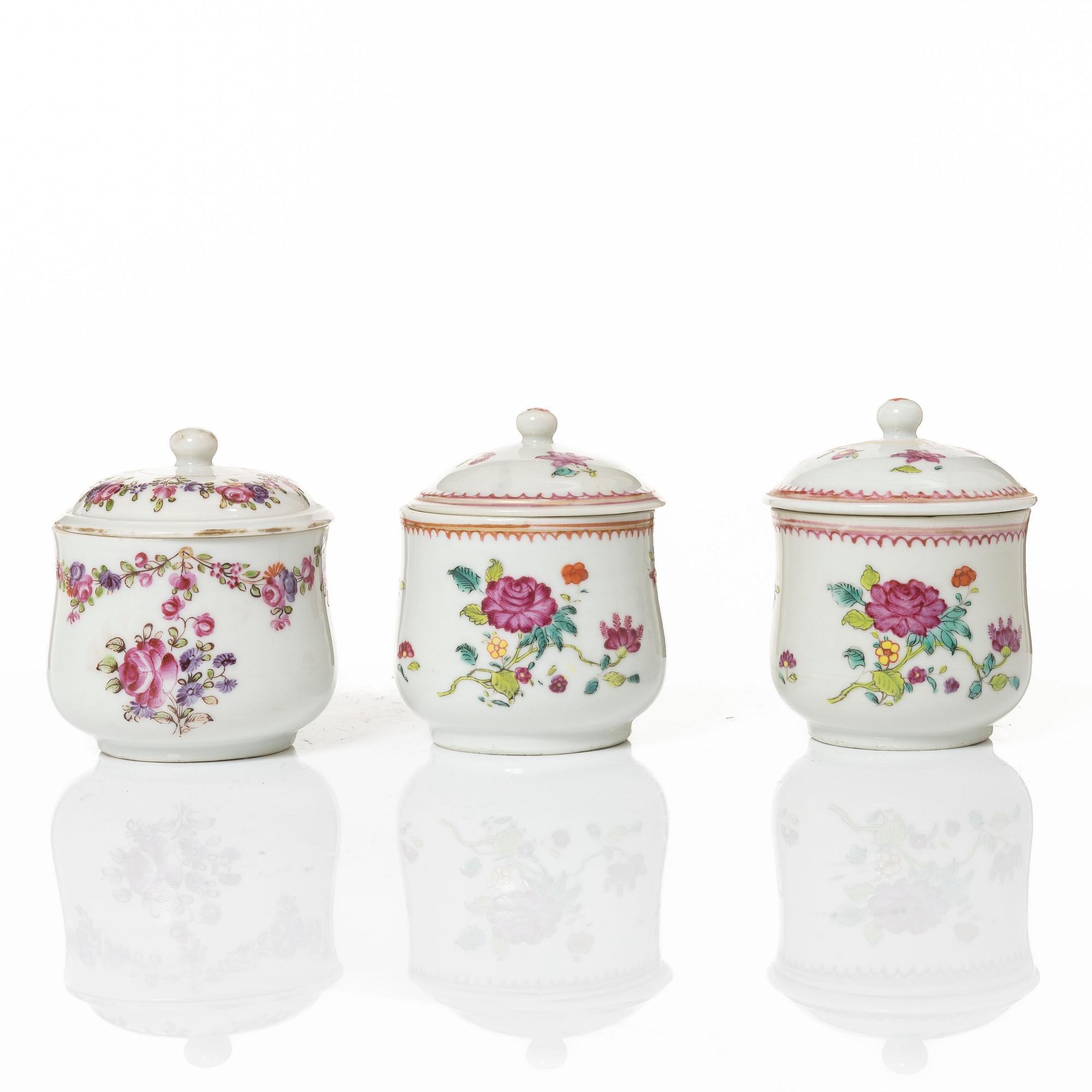 A group of 12 CHinese famille rose porcelain custard cups with covers, Qing dynasty, 18th century.