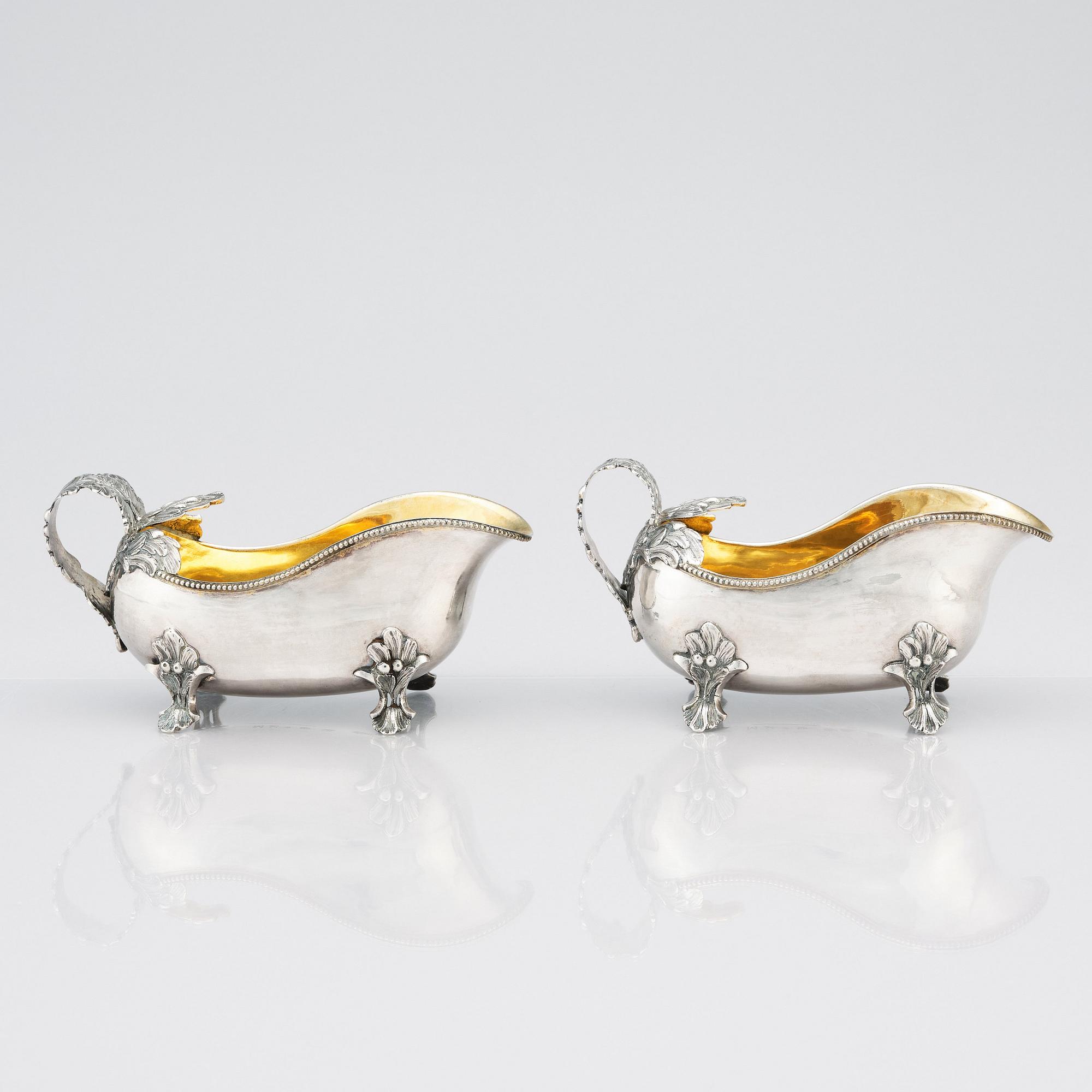 A pair of Swedish Rococo sauce-jugs, mark of Anders Schotte, Uddevalla 1794.