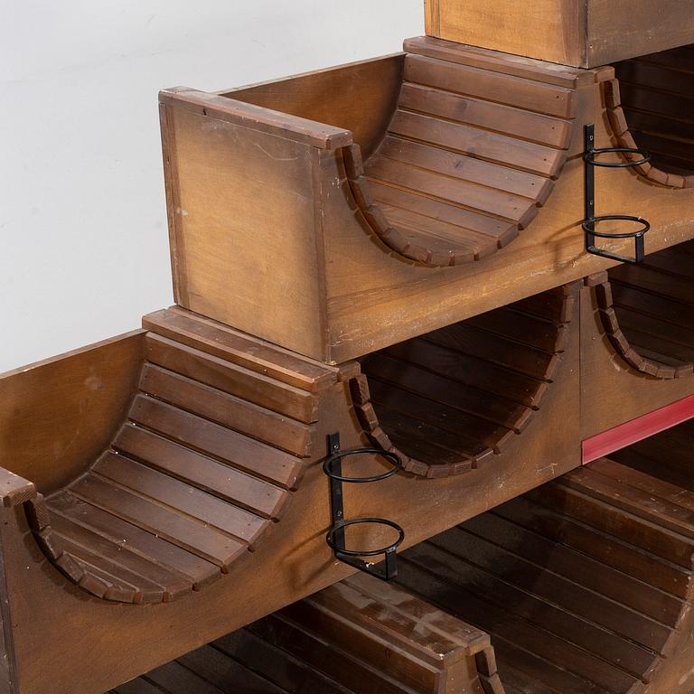 A set of nine loose wood wine racks from the turn of the century 1900/2000.