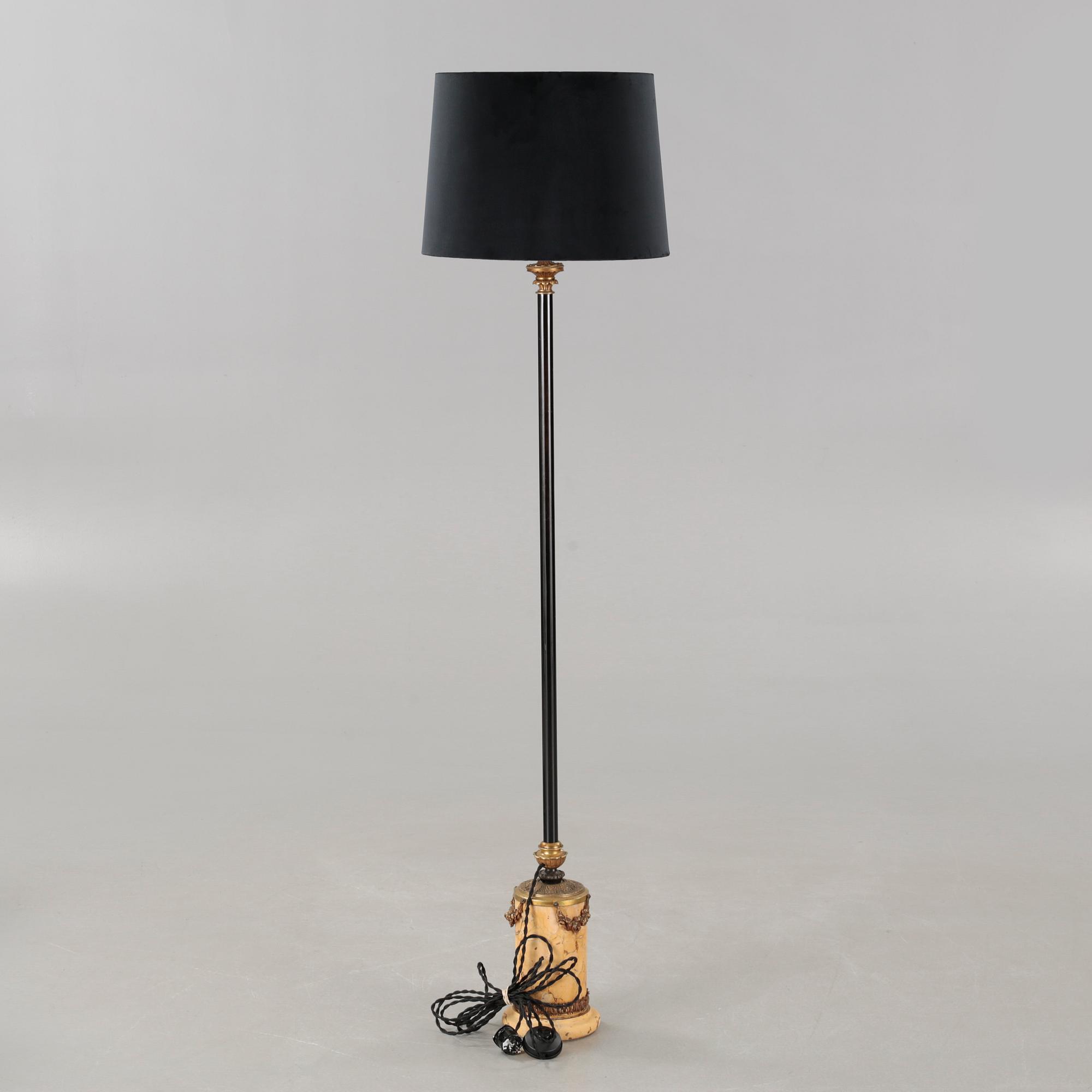 A floor lamp, made in the first half of the 20th century.