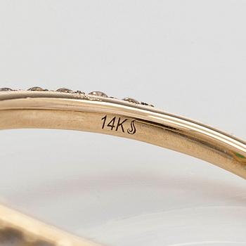 Ring, 14K gold with pear-cut Colombian emerald and diamonds. Accompanied by GIA report.