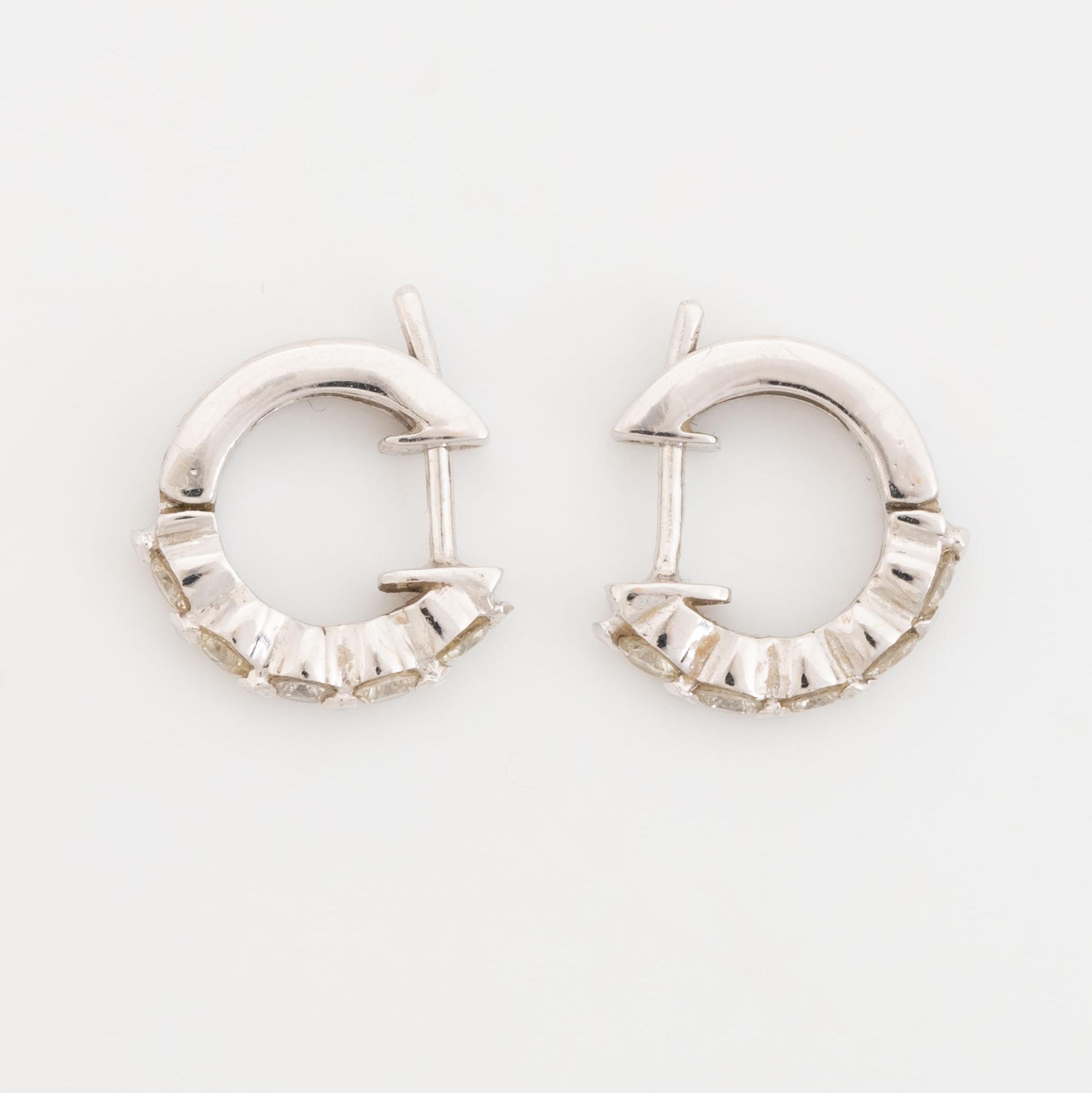 Brilliant cut diamond earrings.