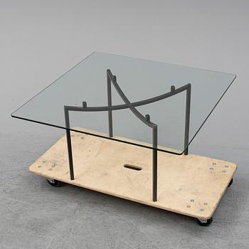 GEORG TOTH, an iron and glass coffee table, signed G. Toth and dated 1998.