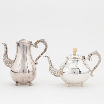 A sterling silver coffee pot, teapot, creamer and sugar bowl.