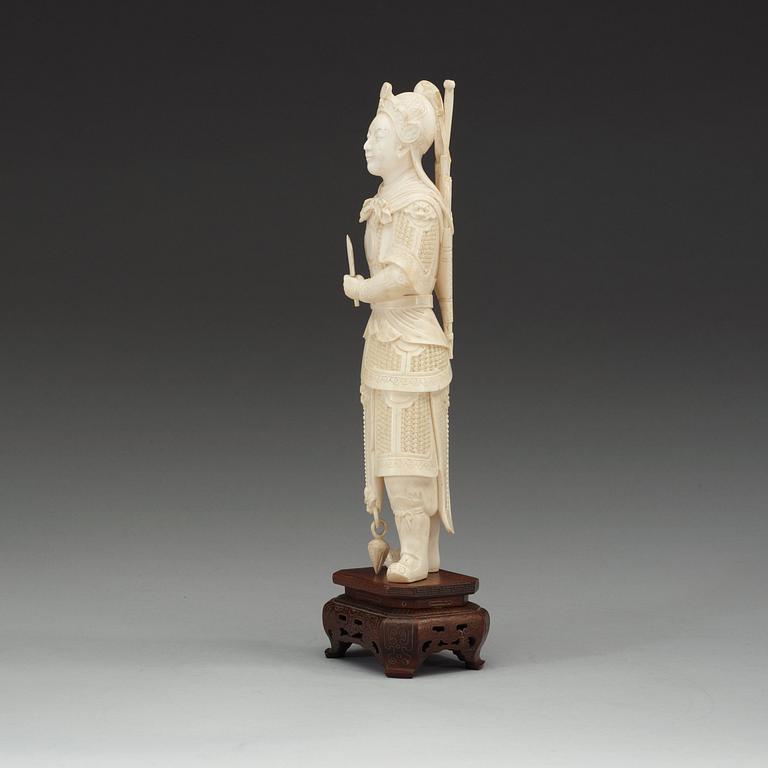 A carved ivory figure of a soldier in arms, late Qing dynasty, circa 1900.