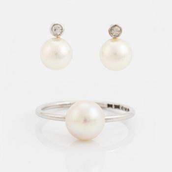 White gold earrings and ring with pearl and white stones.