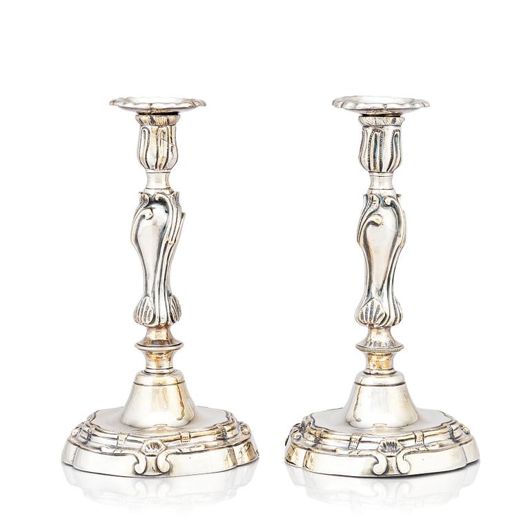 A pair of Rococo candlesticks by Stephen (Friedrich) T. Lemair, (privilge in Stockholm 1762), 1763.