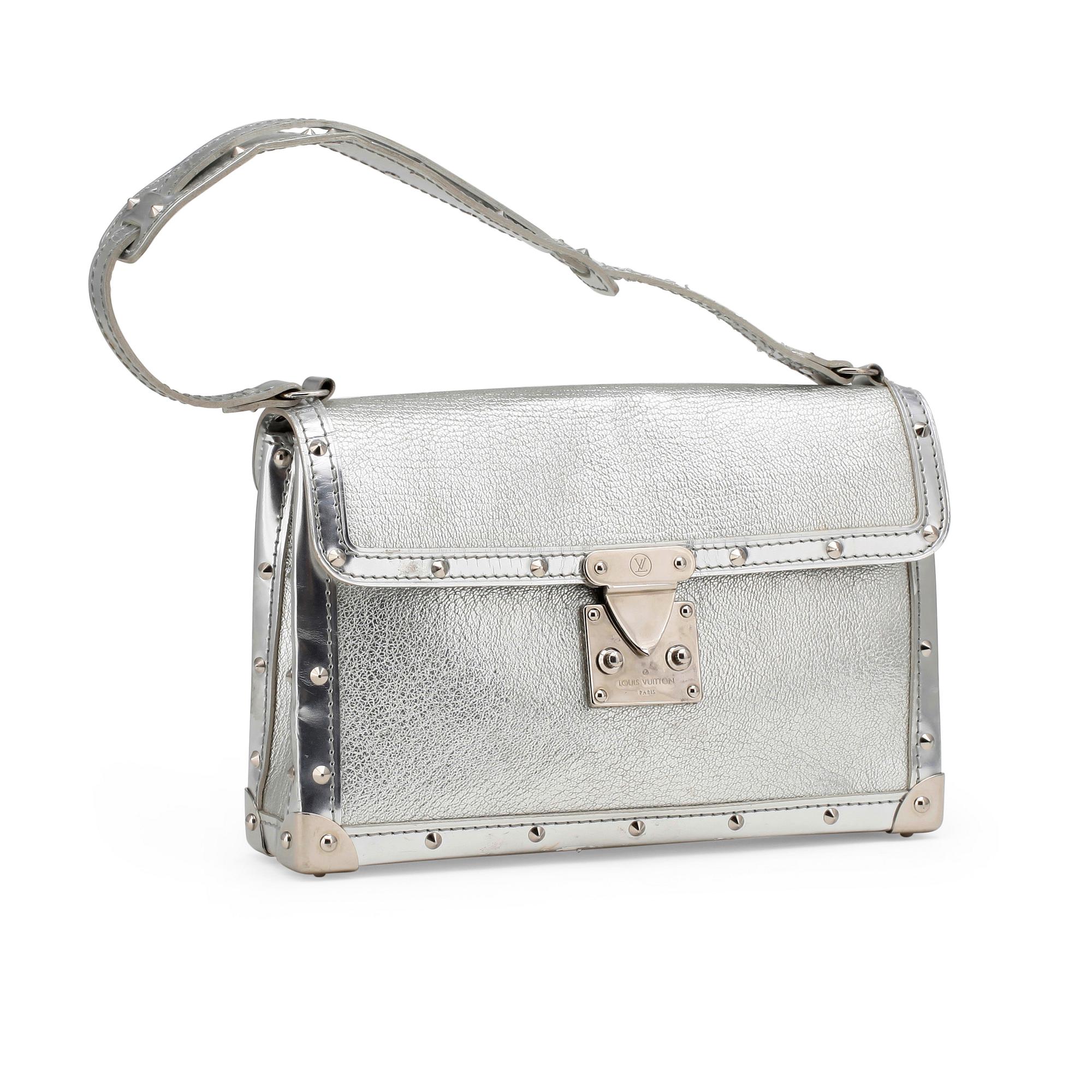 LOUIS VUITTON, a silver coloured leather handbag.