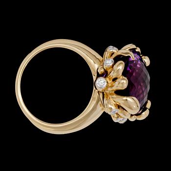An amethyst and diamond ring, tot. app .0.20 cts.