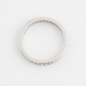 Brilliant cut diamond eternity ring.