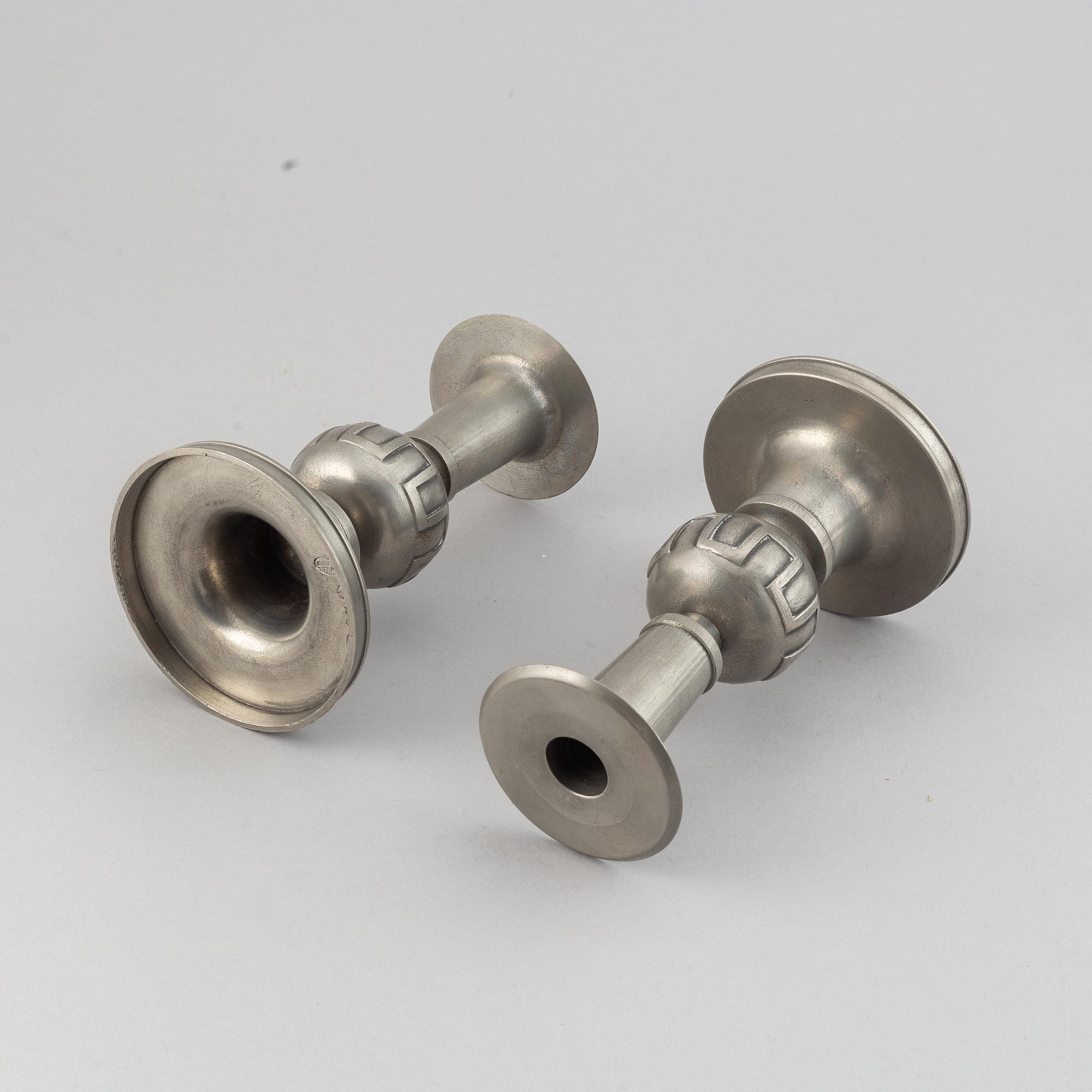 A pair of pewter candle holders by Edvin Ollers, 1952.