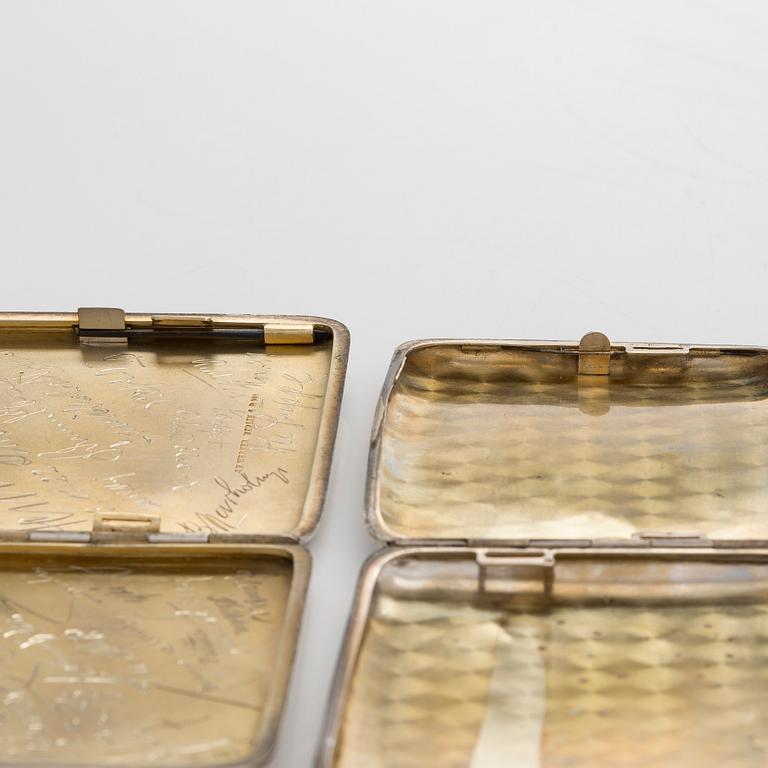 Two silver cigarette cases, J. H. Werner, Berlin, 1922, and Huguenin Frères, Switzerland before 1933.