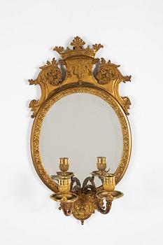 A pair of French Louis XIV-style ormolu two-light girandoles, after a model by Daniel Marot (1661-1752).