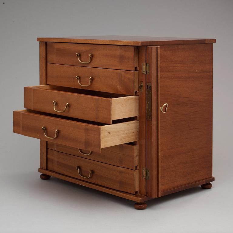 A Josef Frank mahogany miniature chest of drawers, Svenskt Tenn, model 2058.