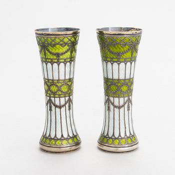 A pair of bud vases in parcel-gilt silver and guilloche enamel, early 20th century.