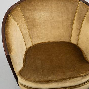 Peter Iversen Langlo, a pair of model 1877 Royal easy chairs from Stranda/Ekornes, Norway, 1940's/50's.