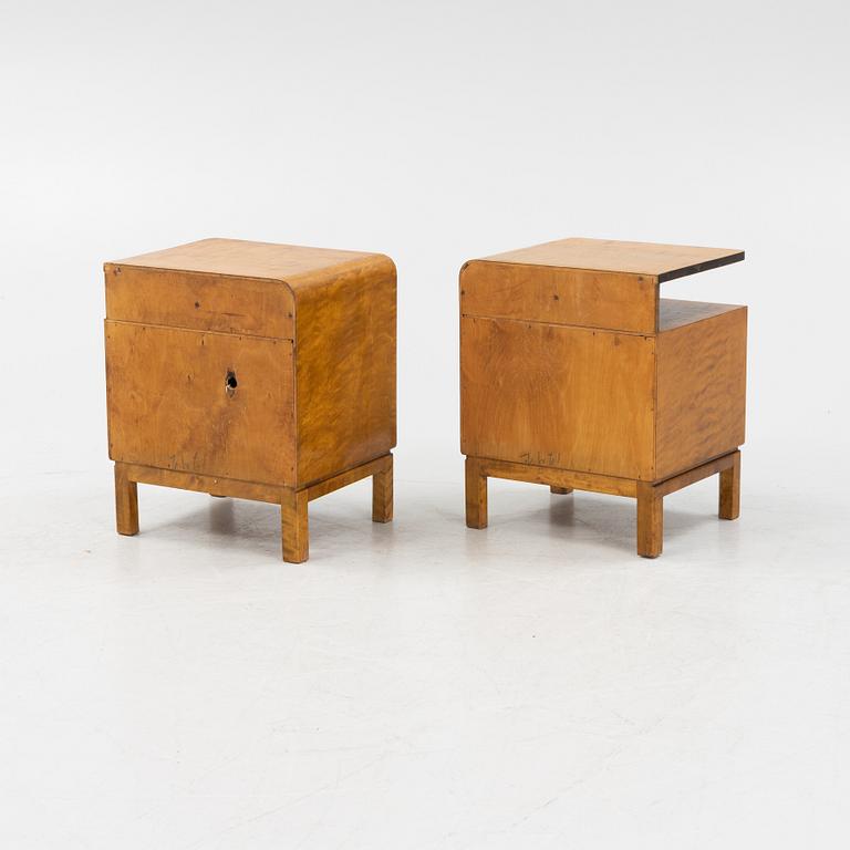 A pair of birch veneered 1930's bedside tables.