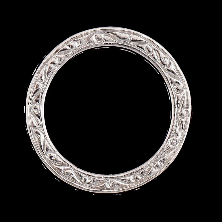 RING, 18K vitguld, fasettslipade rubiner.