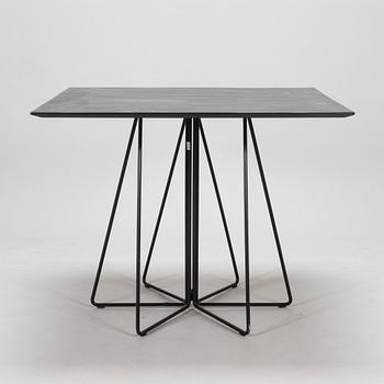 Lella and Massimo Vignelli, A "Paperclip" table in slate from Knoll 1994.