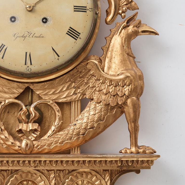 A Swedish Empire wall clock by G Undén.