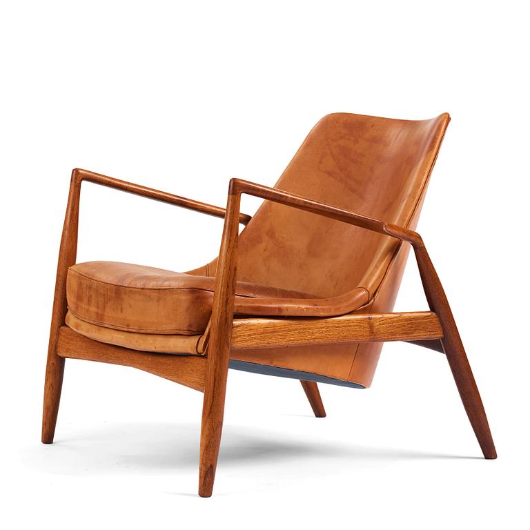 Ib Kofod-Larsen, a teak and cognac coloured leather 'Sälen' easy chair, Olof Perssons Fåtöljindustri (OPE), Sweden, 1950-60s.