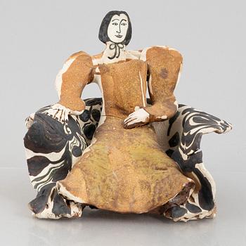 Ulrica Hydman-Vallien, a stoneware sculpture of a seated woman, executed in her own workshop, Sweden.