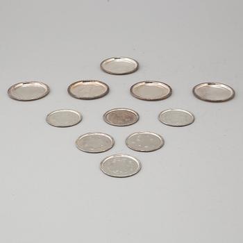 GLASUNDERLÄGG/COASTERS, 11 st, silver. Georg Jensen, sterling, Danmark respektive GAB, Stockholm, 1963-5.