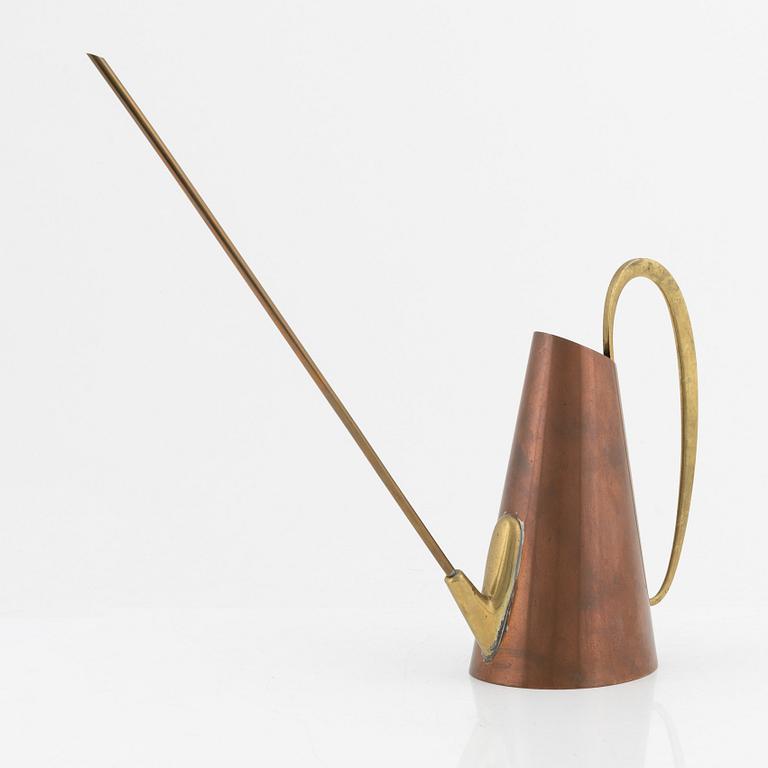 A copper and brass watercan, Illums Bolighus, Denmark, second half of the 20th Century.