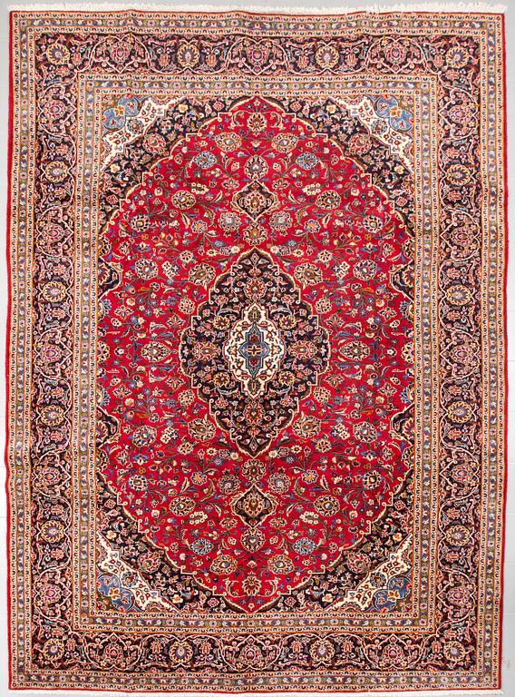 A Keshan rug, 410 x 300 cm.